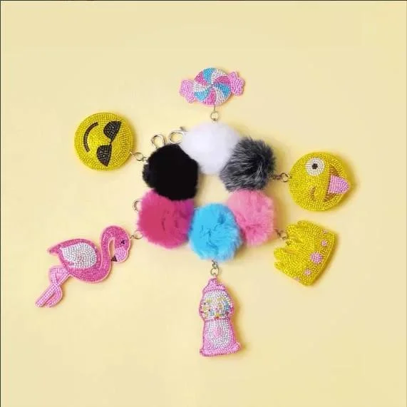 Luxurious But Budget-Friendly Bags Bari Lynn Emoji and Fur Keychains