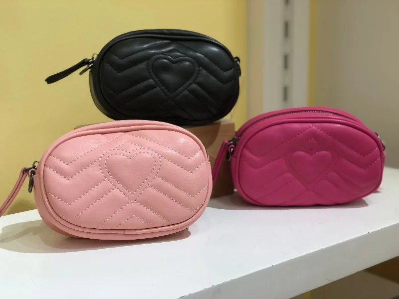 Versatile Bags That Suit Any Outfit Or Event Chloe K Fanny Pack with Heart