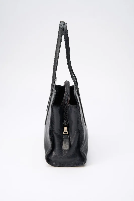 Minimalist Bags For Clean And Modern Aesthetics A vintage 90's Prada Navy Leather Shoulder Bag