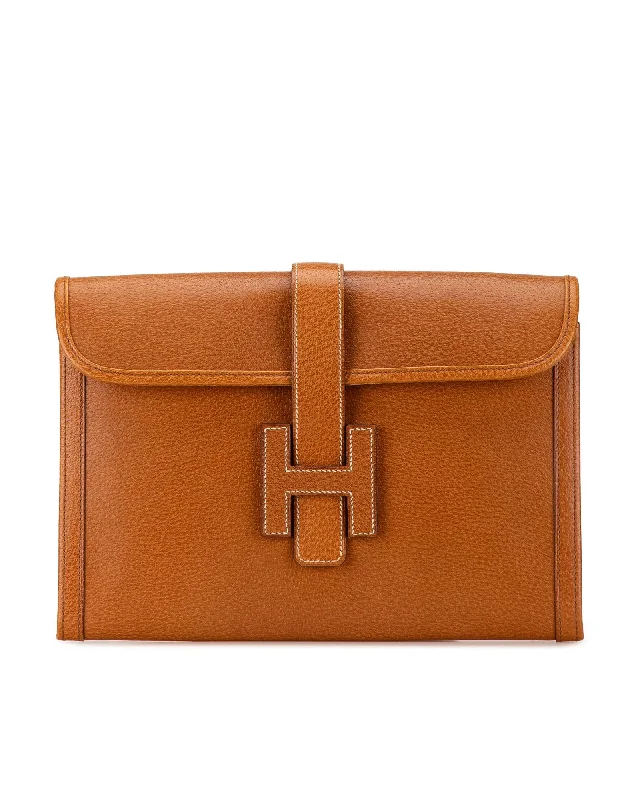 Rustic Bags For Outdoor And Nature-Inspired Looks Peau Porc Leather Clutch with Pull-Through Strap Closure