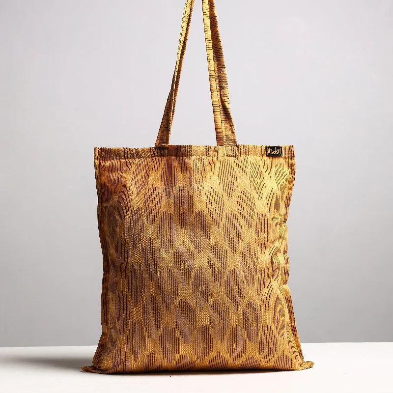 Functional Bags For Busy Moms And Dads Brown - Handcrafted Pochampally Ikat Weave Cotton Jhola Bag Functional Bags For Busy Moms And Dads Brown - Handcrafted Pochampally Ikat Weave Cotton Jhola Bag