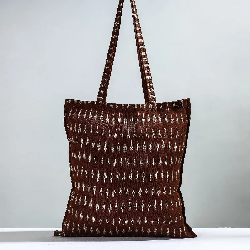 Minimalist Leather Bag For Modern Aesthetics Brown - Handcrafted Pochampally Ikat Weave Cotton Jhola Bag Minimalist Leather Bag For Modern Aesthetics Brown - Handcrafted Pochampally Ikat Weave Cotton Jhola Bag